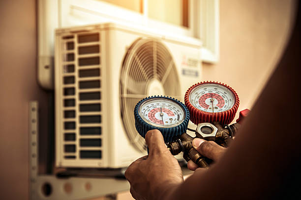 Professional Air Conditioning Service technician working in Stephenson, VA